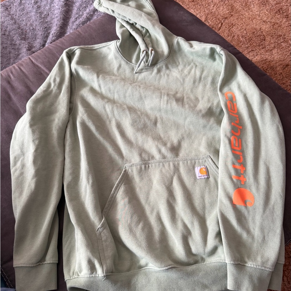 Carhartt Olive Hoodie with Vibrant Orange Sleeve Logo